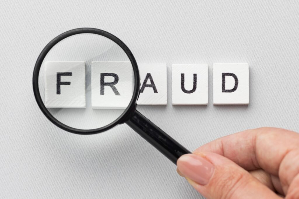 fraud-word-magnifying-glass