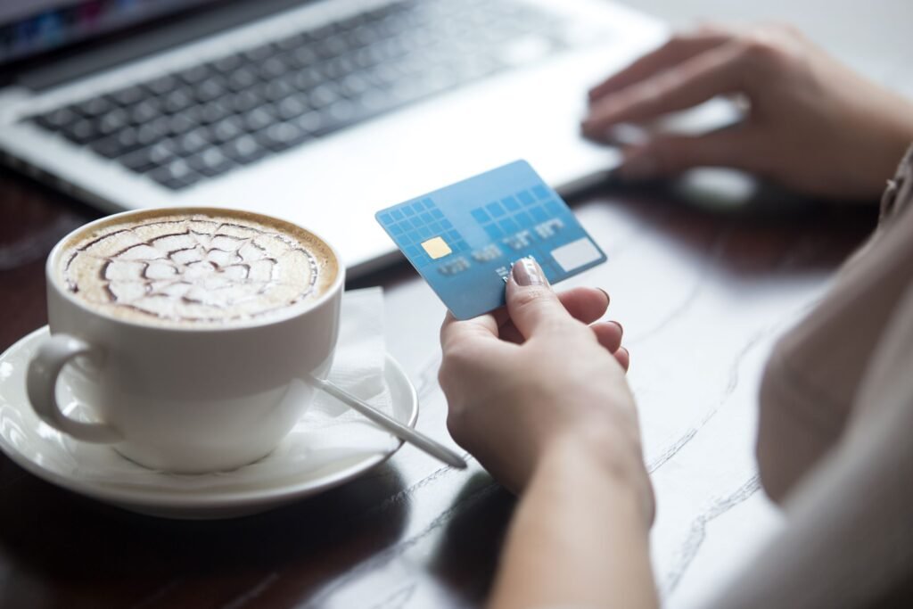 modern-woman-using-credit-card-online-payment-close-up